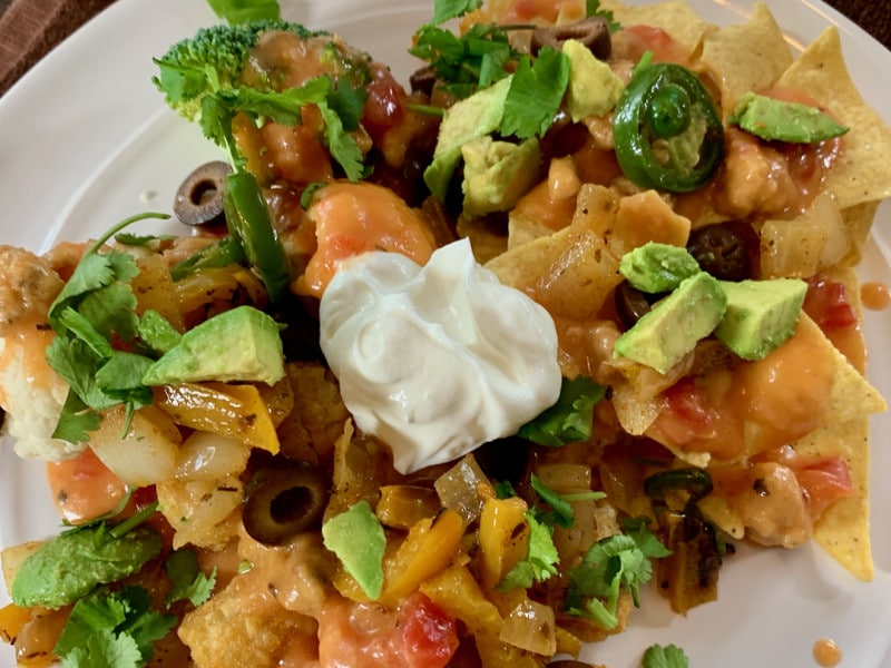 plated piled with nachos