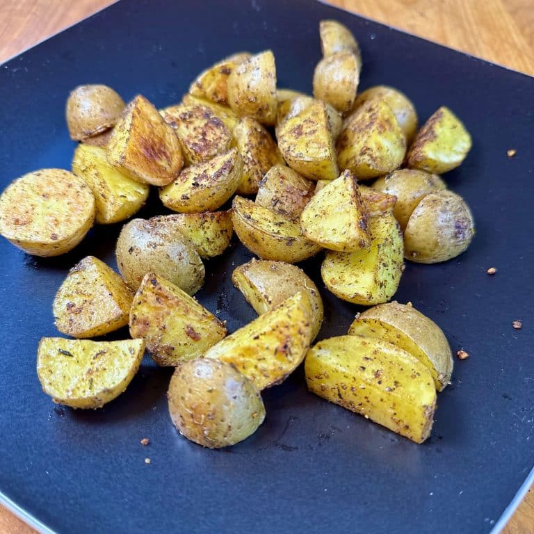 plate of cooked rosemary roasted potatoes