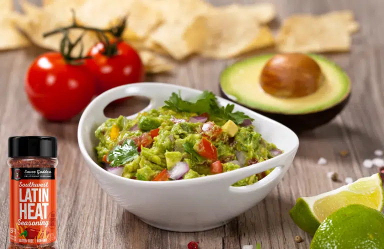 White bowl of Guacamole with Latin Heat seasoning from Sauce Goddess